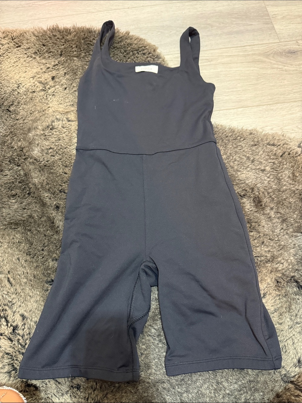 Babaton Black Sleeveless One-Piece Bodysuit